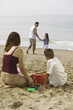 Family Playing on the Beach