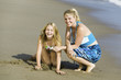 Mother and Daughter Together on Beach