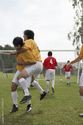 Foto: Soccer Players Celebrating a Goal Soccer Players Celebrating a Goal
