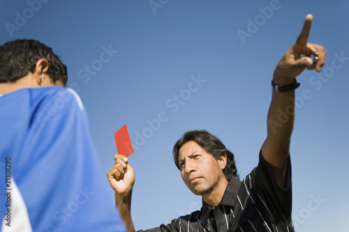 Photo: Referee Ejecting Soccer Player from Game Referee Ejecting Soccer Player from Game