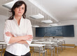 Attractive teacher in classroom