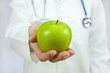 Photo: Doctor Holding Green Apple Doctor Holding Green Apple