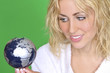 Beautiful Blond Woman With Globe On Green Background