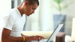 Video: Happy young man working on laptop Happy young man working on laptop