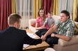 Happy family meeting with agent at home