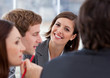 Portrait of an assertive businesswoman and her team