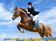 Photographie : Equestrian jumper - Young girl jumping with sorrel horse