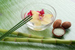 flower in bowl with incense and bamboo spa concept