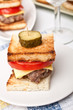 baby burger on a white plate