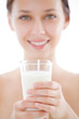 Portrait of a woman drinking milk