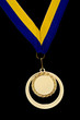 Gold medal isolated on black