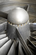 close-up of the blades of a jet engine turbine