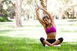 Photo: Young Woman Doing Yoga in Park Young Woman Doing Yoga in Park
