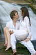 Sensual couple by waterfall Sensual couple by waterfall