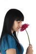 girl smells a flower