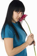 girl smells a flower