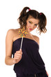 girl holds a sugar candy