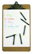 Photo: Clipboard with a childs to-do list and colorful crayons Clipboard with a childs to-do list and colorful crayons