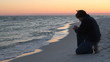 Kneeling Prayer At Sunset