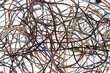 A tangle of colored wires on the ground A tangle of colored wires on the ground