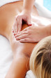 Massage Techniques III - woman receiving professional massage.