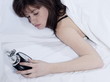 woman in bed awakening