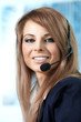 Beautiful representative smiling call center woman with headset. Beautiful representative smiling call center woman with headset.