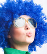 happy woman in blue wig in Sunglasses
