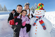 Photos : Famille en vacances à la neige