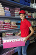 young woman working  in a gift box store