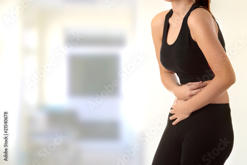 Photo: Woman with stomach issues Woman with stomach issues