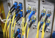 Photo: Optic cables connected to router ports Optic cables connected to router ports