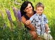 young mother with son on meadwow - mutter sohn wiese