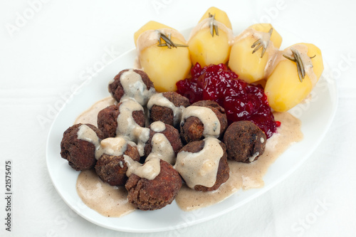 Photo: Swedish Kottbullar meatball with brunsas sauce, boiled potatoes Swedish Kottbullar meatball with brunsas sauce, boiled potatoes