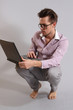 a young man with a laptop