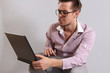 a young man with a laptop