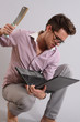 a young man with a laptop