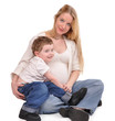 Pregnant Mother and Happy Son Hugging