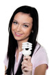 Women with energy-saving lamp. Energy saving lamp for