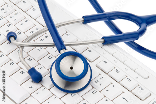 Photo: Computer keyboard and stethoscope. IT for physicians. Computer keyboard and stethoscope. IT for physicians.