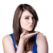 Blowing a kiss