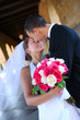 Bride and Groom Kissing at Wedding