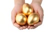 Three golden egg in the hands