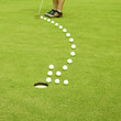 Golfing. Straight to the goal. Arrow made of balls.