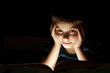 Boy reading bedtime story
