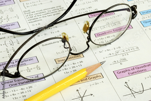 Photo: Doing some grade school Math with a pencil Doing some grade school Math with a pencil