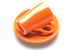 Une tasse de cafe & sous-tasse orange Une tasse de cafe & sous-tasse orange