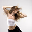 dancing young girl waves the hairs