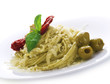 Italian Pasta with Pesto sauce,olives,basil and dried tomato