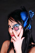 Woman with butterfly makeup Woman with butterfly makeup